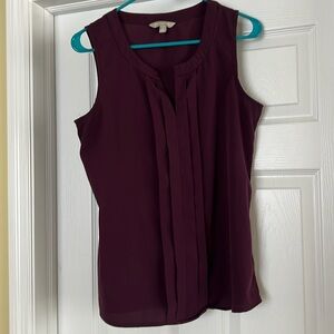 Bundle four women’s blouses, 3 sleeveless. Long sleeve has attached tank